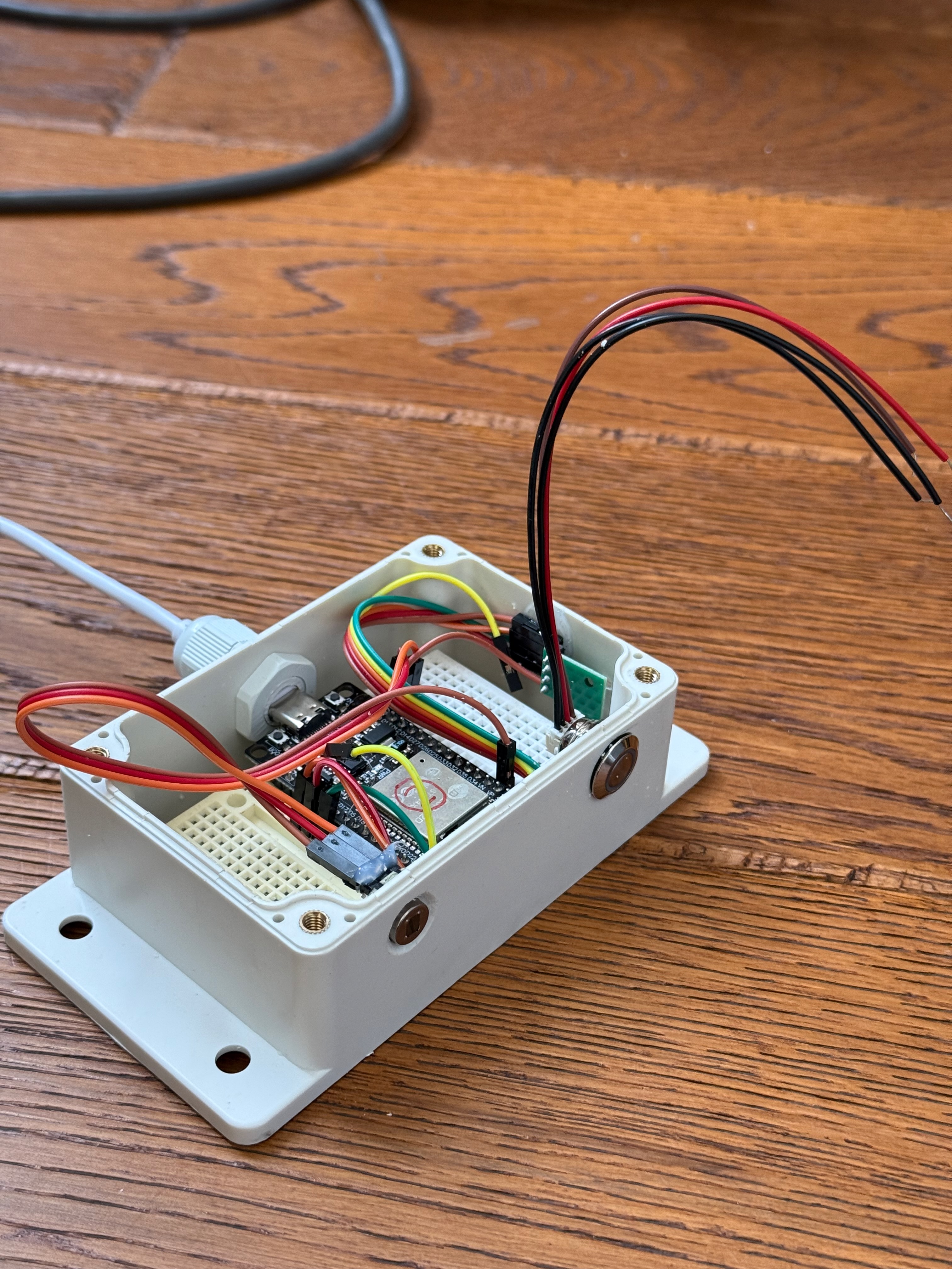An Axon ESP32 probe prototype, with breadboards and sensor wiring inside an open enclosure.
